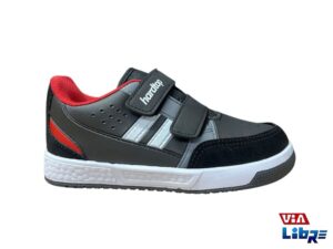 Zapatillas urbanas de ecocuero con abrojos negro/rojo